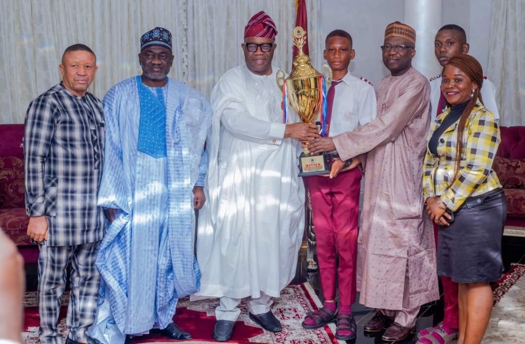 NILDS QUIZ : SENATE PRESIDENT PRESENTS TROPHY, CASH TO NILDS NATIONAL QUIZ WINNER.